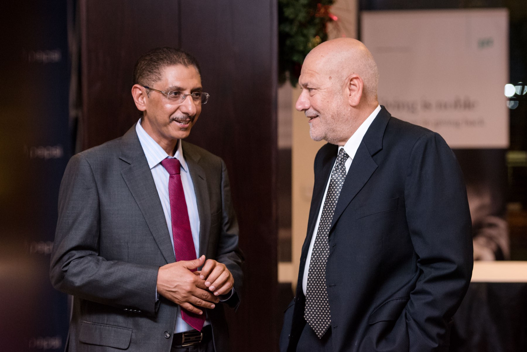 Two chief executives in conversation at a CEOrt gala